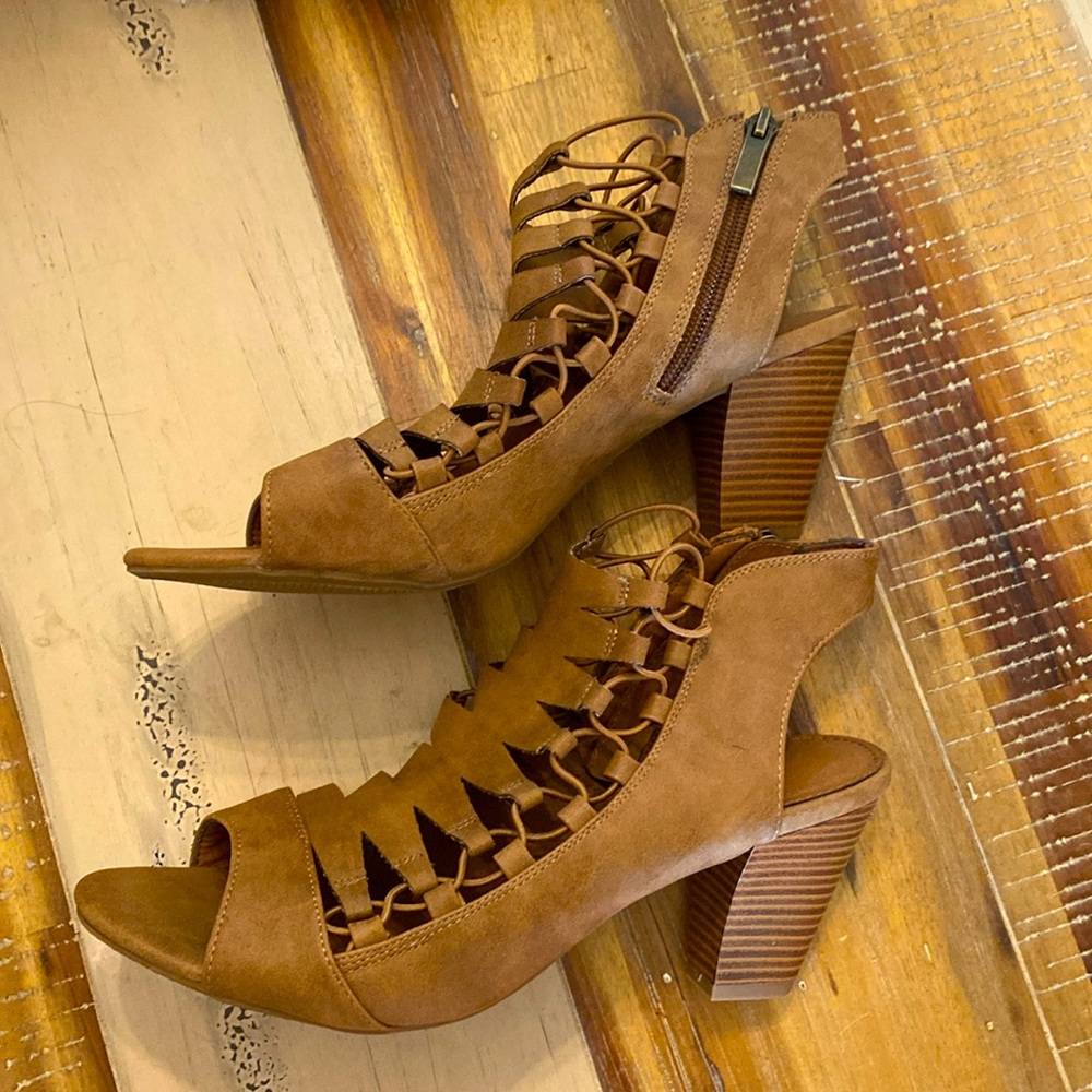 Gently worn couple of times leather sandal boot with approx. 2 1/2” heel